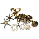 A gold plated watch chain and various silver fobs, two silver shield fobs marked 1914 and NDCL