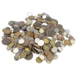 A large quantity of British and foreign coins, a coin bracelet and a double headed coin.