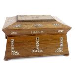 An early Victorian rosewood and mother of pearl inlaid sarcophagus shaped jewellery box, with ring