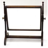 A 19thC mahogany dressing table mirror, the rectangular plate with a reeded edge on turned supports,