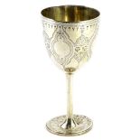 A Victorian silver goblet, engraved overall with cartouches, flowerheads, etc., personalised