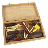 A collection of late 19th/early 20thC and later pipes, cheroot holders, etc., to include an