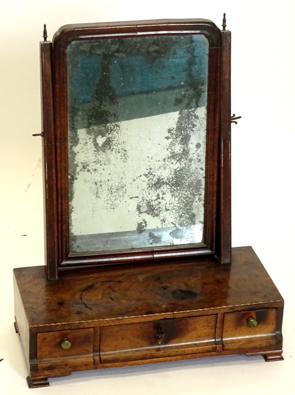 A 19thC walnut dressing table mirror, the rectangular mirror plate on tapering supports, the chequer