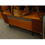 A radiogram in a teak case.