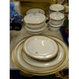 A quantity of Mintons patent number 14095 dinner wares, to include meat plates, lidded tureens,