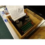 A child's Liliput typewriter.