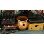 A terracotta plant pot, and various plastic plant pots and trays etc.(contents of under one table).