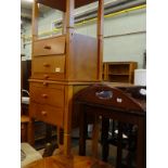 A pair of pale wood two drawer bedside cabinets, a reproduction butlers tray with folding top, and a