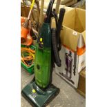 A Hoover extra light weight vacuum cleaner.