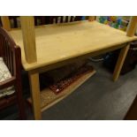 A stripped pine kitchen table.