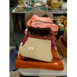 Various ladies handbags, to include an orange suede Tula bag, a pink suede handbag with brown