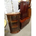 A mahogany bow fronted hanging corner cabinet with single door, a TV stand and a CD cabinet (3).