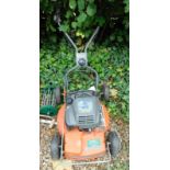 A Husqvarna 45 XTL rota mower.