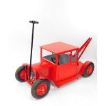 A red model tow truck, plywood and fabricated metal bodied, 180cm long.