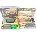 A Scalextric model motor racing set 50, and a further set numbered CM.33, both boxed. (2)