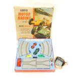 An Airfix Motor Racing set, scale 1:32, model MR15, boxed, together with an Airfix power unit. (2)