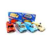 Four Kaden mechanical Police, Ambulance and Post Office vans, with friction action, boxed.