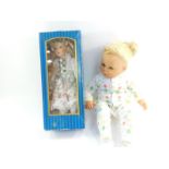 A Zapf Creation doll, serial no. 65-20, together with a collector's doll, boxed. (2)