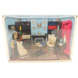 A Victorian doll's house room setting, showing a gentleman's study, perspex cased, 36.5cm wide, 26.