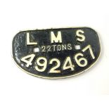 A cast iron wagon plate, white painted high relief, 'LMS, 22 tonnes, 492467'., 28.5cm wide.