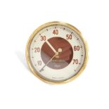 A Smiths Rev meter, believed to be for a Morris Ten, brown and white dial, serial no 53186/1/1600,