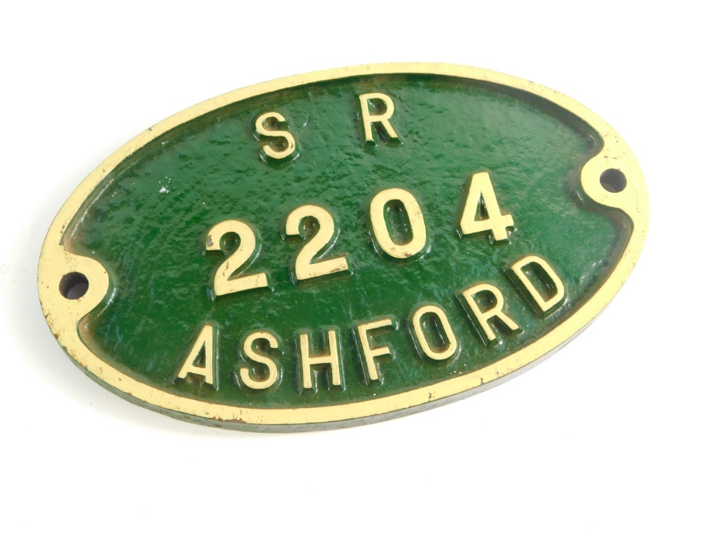 A Southern Railways cast iron wagon plate, white painted high relief against a green ground, 'SR2204