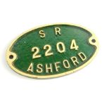 A Southern Railways cast iron wagon plate, white painted high relief against a green ground, 'SR2204