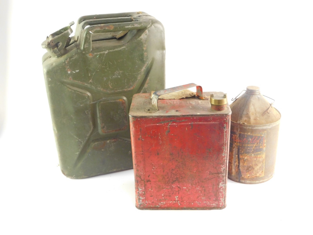 A military jerry can, olive green, dated 1966, red petroleum spirit can, and a Carr's Paints Ltd