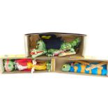 Three Pelham puppets, boxed, comprising Frog, Caterpillar and Dragon.