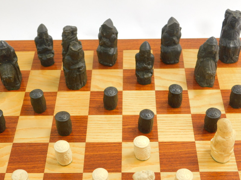 A replica resin Lewis chess set, with a wooden chess board, 47cm diameter, together with a plastic - Image 3 of 5