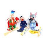 Three Pelham puppets, boxed, comprising Wolf, King and Policeman.