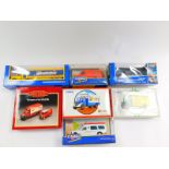 A Corgi die cast NSPCC Bedford van, Youngster's Bedford O series van, Weetabix Scammel container,