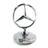 A Mercedes 280SE mascot 1972, 12cm high.