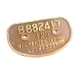 A cast iron wagon plaque, white paint high relief, 'B882417, 12T, Wolverton 1960, Lot No 3290'.,