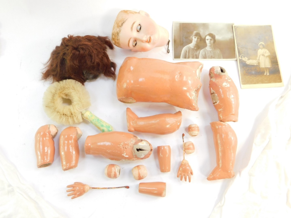 A Schoenau & Hoffmeister bisque head doll, 1909, 2 1/2, with a composite body and clothes, - Image 3 of 5
