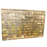 A North Eastern Railway black cast iron rectangular sign, 'North Eastern Railway Public Warning,