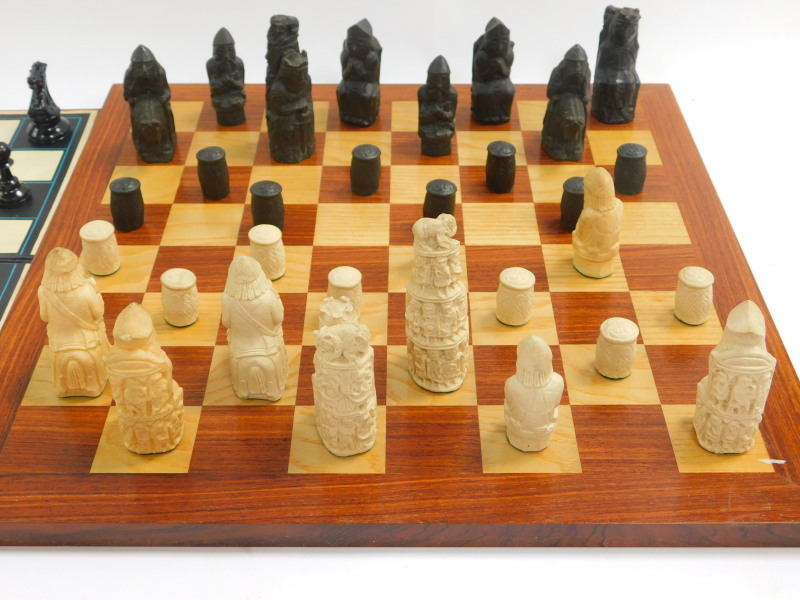 A replica resin Lewis chess set, with a wooden chess board, 47cm diameter, together with a plastic - Image 2 of 5