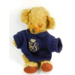 A Merrythought Cheeky Teddy Bear, with golden mohair and bells in it's ears, 29cm high.