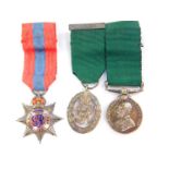 A miniature George V Volunteer Long Service Medal for India and The Colonies, together with a George