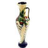 A Moorcroft pottery jug, decorated in the Wisteria pattern by Phillip Gibson, limited edition 54/