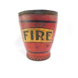 A 19thC red leather fire bucket, lacking carrying handle, 28cm high, 25.5cm diameter.