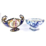 A Victorian flow blue pedestal bowl, with gilt decoration, two moulded handles and quatrefoil