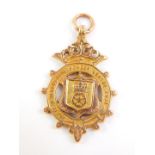 A 9ct gold Notts & Derbyshire Border Cricket League medallion 1921, verso engraved 'Won by Heanor