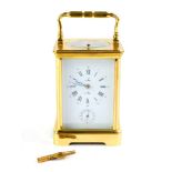 A Jacot A Paris brass cased repeater alarm carriage clock, rectangular dial bearing Roman and Arabic