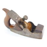 A Hearnshaw Bros 19thC steel and brass infill plane, wooden handle, the brass stamped Spiers,