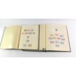 Philately. A Simplex Stanley Gibbons stamp album, containing a collection of predominantly GB George