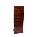 A Victorian rosewood narrow chest, of nine drawers, raised on a plinth base, 168cm high, 63cm