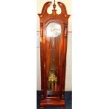 A Millennium mahogany finished long case clock, with broken arch pediment, oval shell paterae,