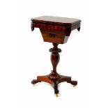 A Victorian rosewood sewing table, the octagonal hinged top opening to reveal a fitted interior,