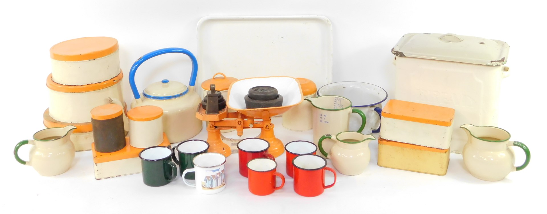 Pre and post war kitchenalia, including enamel wares, bread bin, kettle, chamber pot, mugs and jugs,